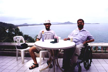 Gene and Davin rest after a nice meal in Thailand.