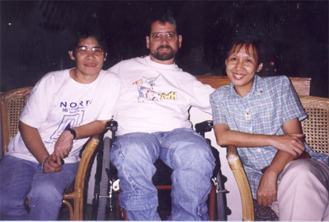 A group of people sitting posing for the camera