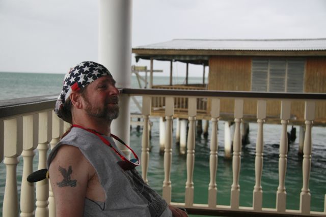 Gene sitting at an outdoor Puerto Rican restaurant.