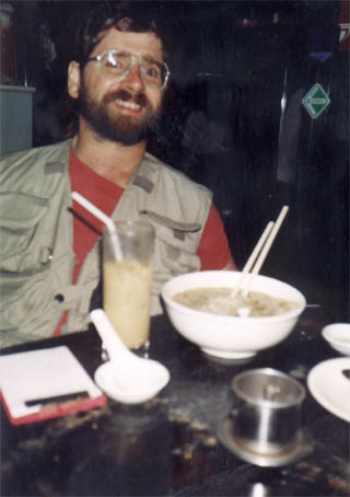 Gene in a Hong Kong restaurant eating soup