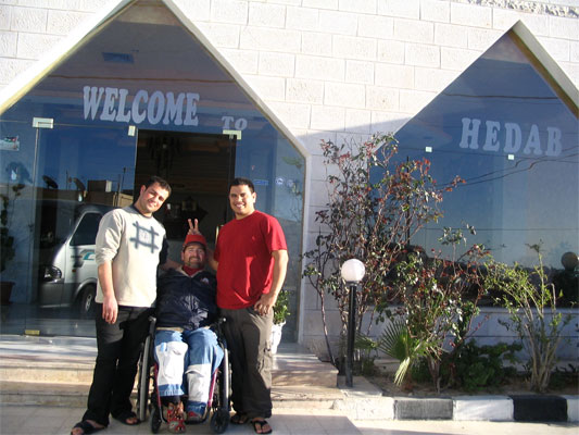 Gene and friends in front of hotel in Jordan