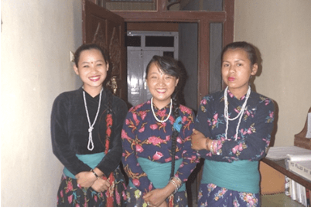 Three Nepalese women posing for the camera