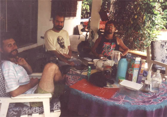 Gene and friends sitting at a table enjoying breakfast