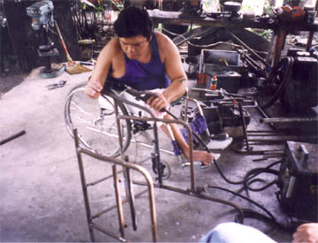 A woman working on a custom wheel chair