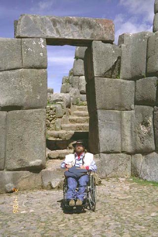 Gene poses in front of an ancient Incan stone doorway