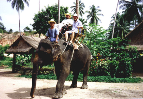 Gene riding an elephant in India