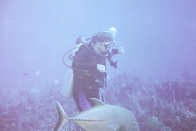 gene swimming next to a fish