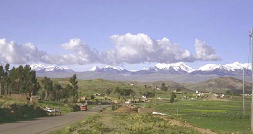 beautiful landscape view of Peru with snow caped mountains in the distance