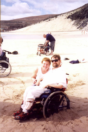 A woman and Gene on a beach