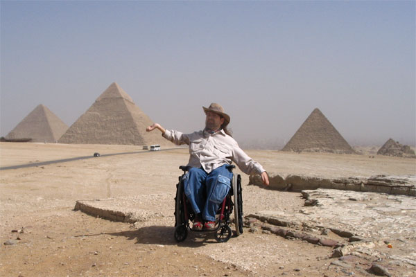Gene posing in front of the Great Pyramids of GIza.