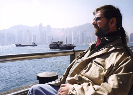 Gene on a dock in Hong Kong
