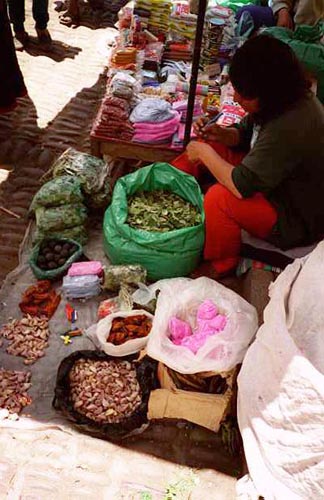 Grain and other goods at an outdoor market in Peru