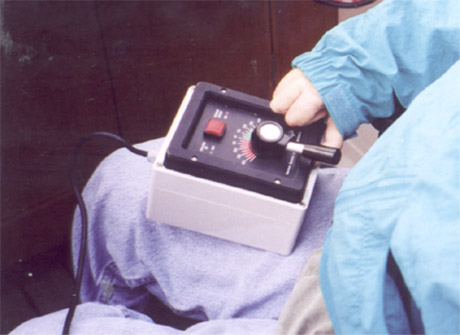 Close up of a joystick being used by Gene