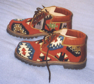 Turkish shoes styled in a traditional carpeted pattern