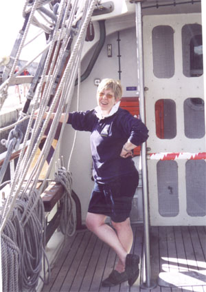 Sue posing on the ship