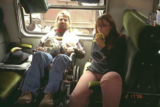 Gene and a friend on a train