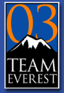 Team Everest logo. A graphic of a mountain with orange numbers "03"
