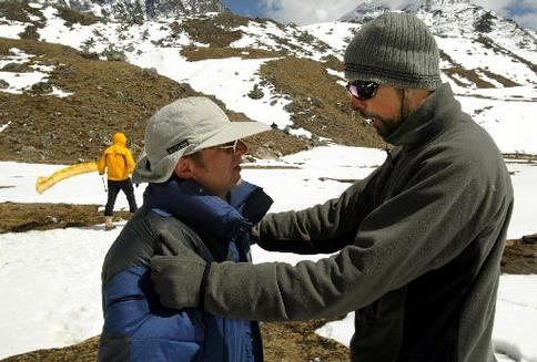 Gene's brother is being counseled by Janis, the team doctor before they leave the mountain.