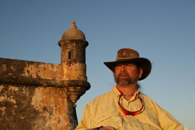 Gene enjoying the sunshine outside at Castillo San Felipe del Morro.