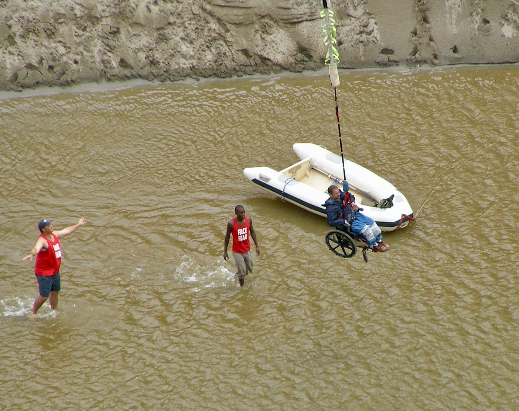 Gene bungee jumping from a bridge in South Africa over a river