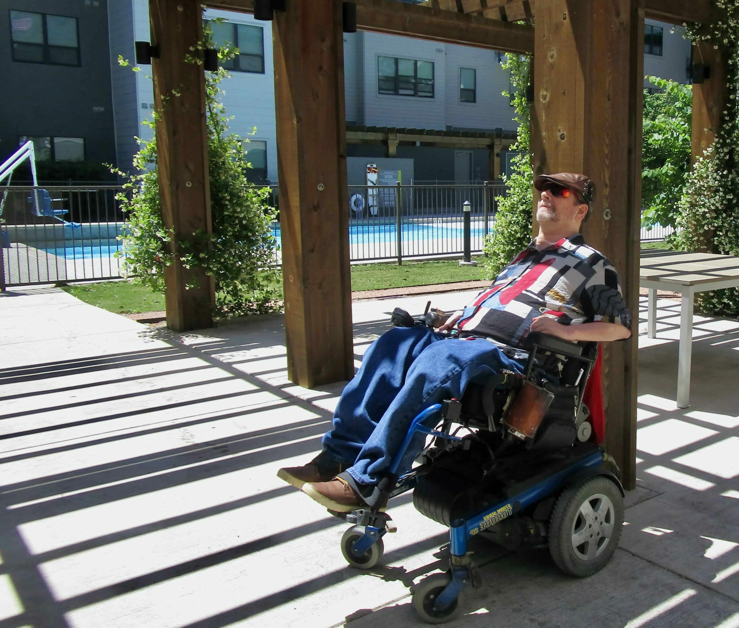 Gene relaxing outside enjoying the sunshine.